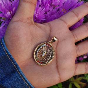 014   14k plated gold pendant