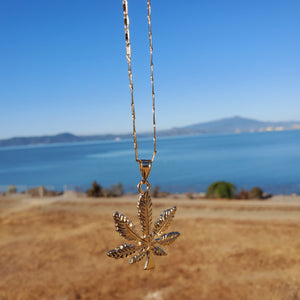 18k plated gold chain and pendant mariguana